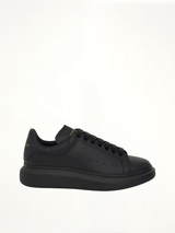 Larry Oversized Rubber Sneaker in Black Side View | ALEXANDER MCQUEEN