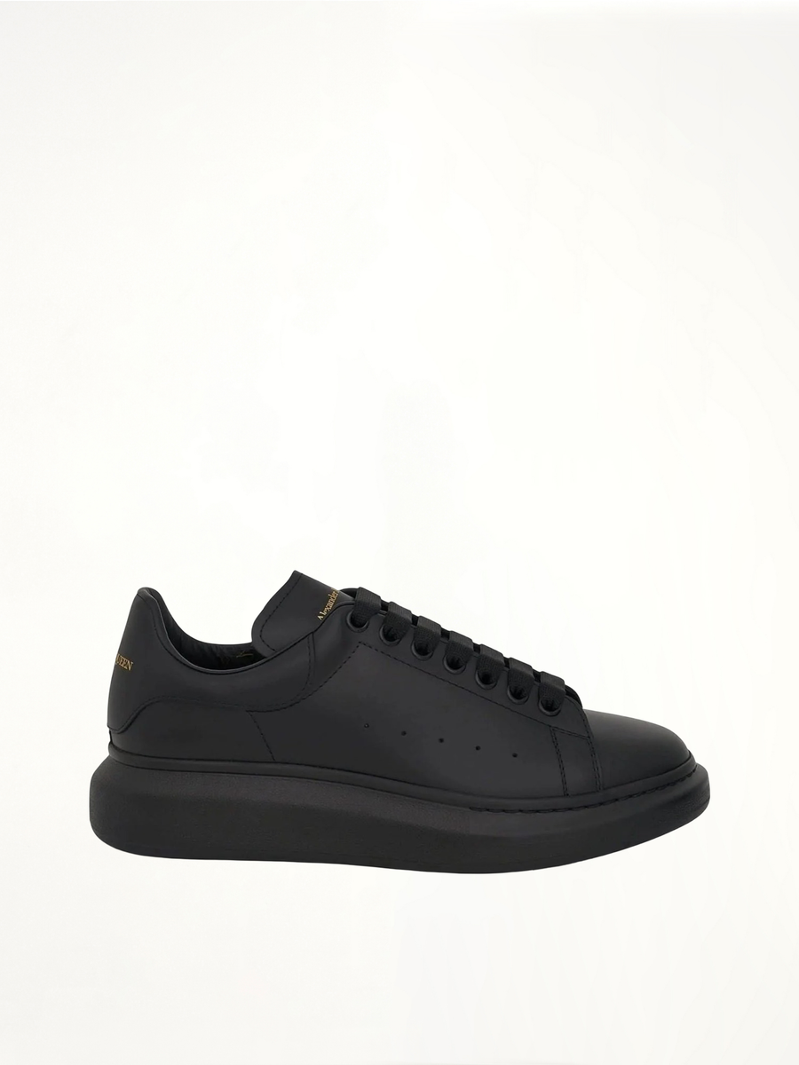Larry Oversized Rubber Sneaker in Black Side View | ALEXANDER MCQUEEN