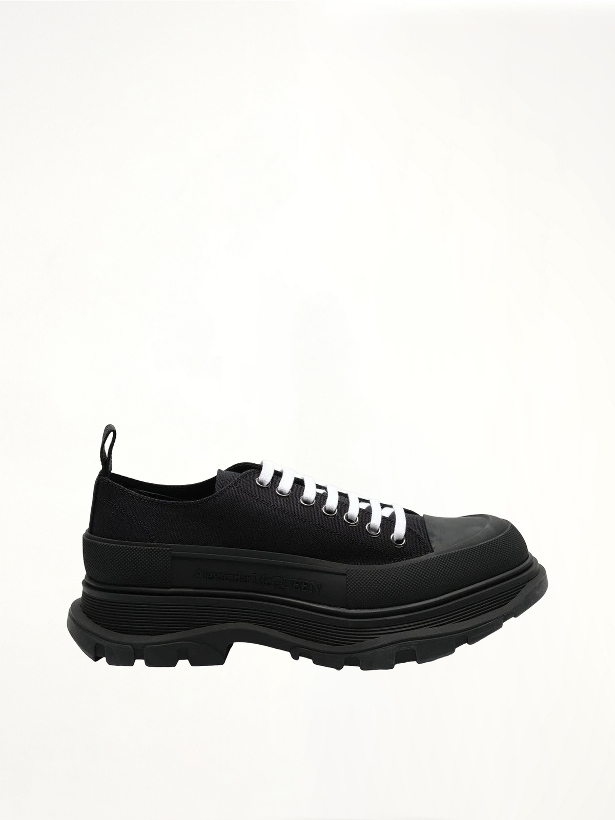 Tread Slick Canvas Lace-Up Shoes in Black Side View | ALEXANDER MCQUEEN