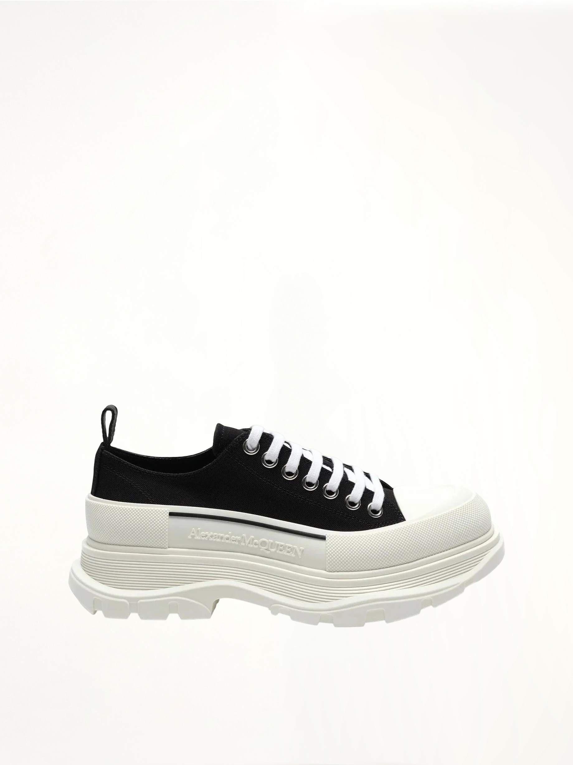 Tread Slick Canvas Lace-Up Shoes in Black/White Side View | ALEXANDER MCQUEEN