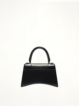 Hourglass Small Handbag in Box Calfskin in Black with Gold Plaque