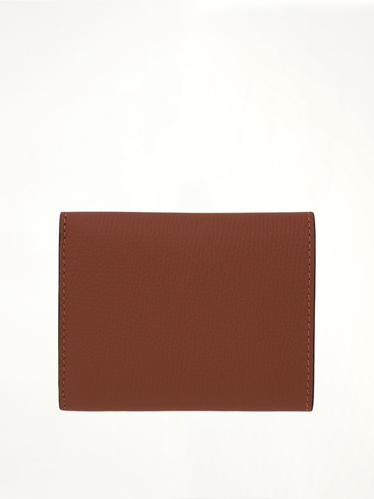 Anagram Trifold Wallet Pebble Grain Calfskin in Tan