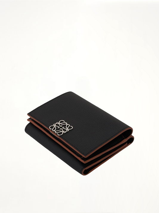 Anagram Trifold Wallet Pebble Grain Calfskin in Black
