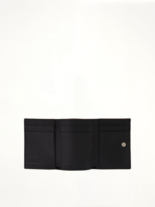 Anagram Trifold Wallet Pebble Grain Calfskin in Black
