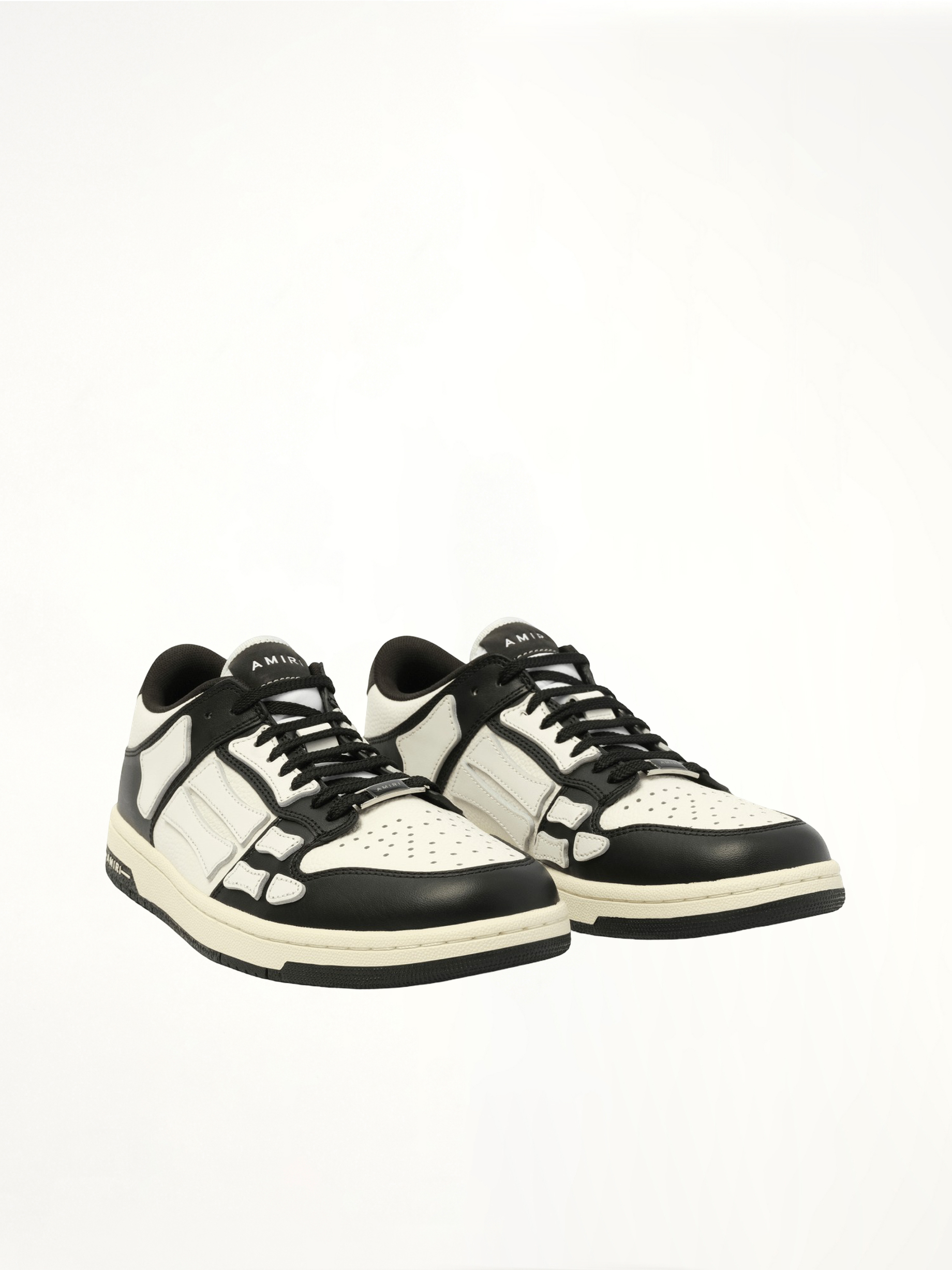 Skeleton Top Low Sneaker in Black/White Front View | AMIRI