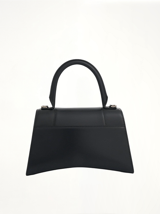 Hourglass Small Handbag in Box Calfskin in Black with Silver Plaque