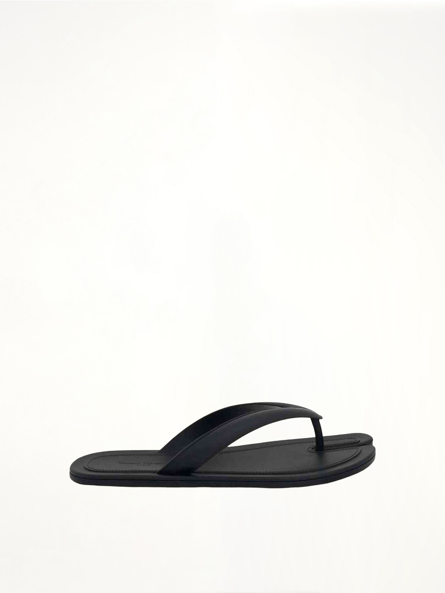 Tabi Slip On Slides in Black Raven Side View | MAISON MARGIELA