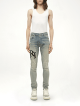 Staggered Logo Skinny Jeans in Antique Indigo/Black