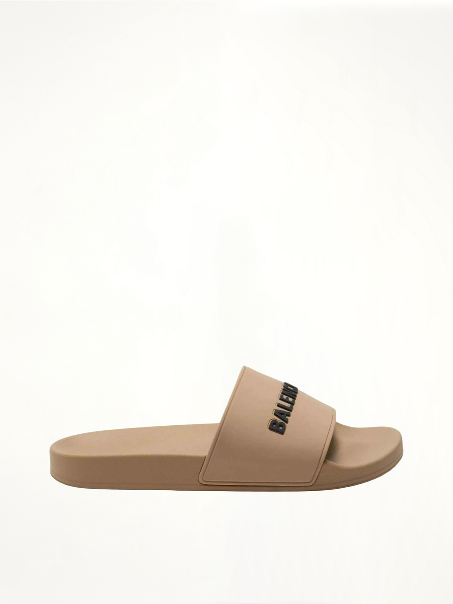 3D Logo Rubber Pool Slide Sandal in Beige/Black Side View | BALENCIAGA
