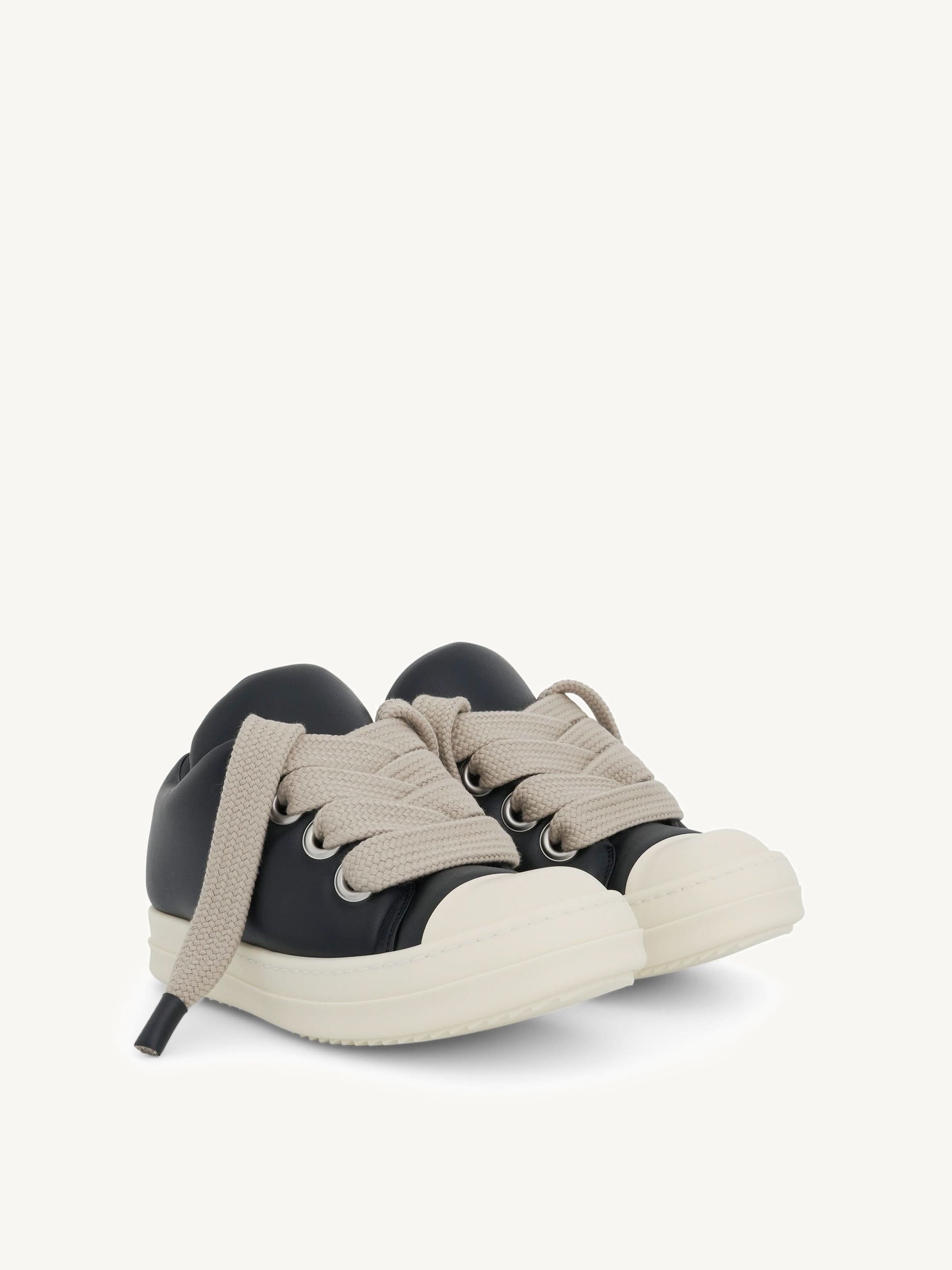Jumbo Lace Padded Low Sneaker in Black/Milk Front View | RICK OWENS