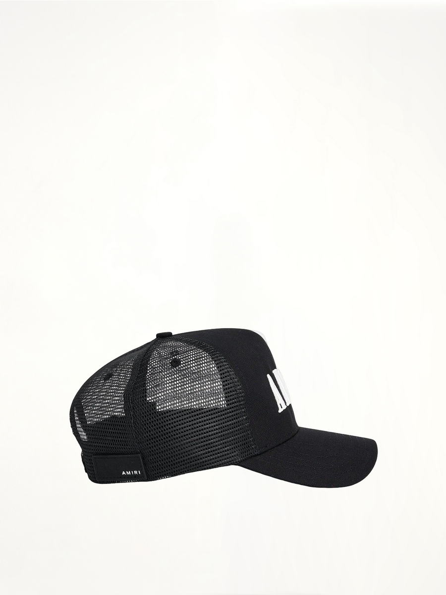 Amiri Core Logo Trucker Hat in Black/White