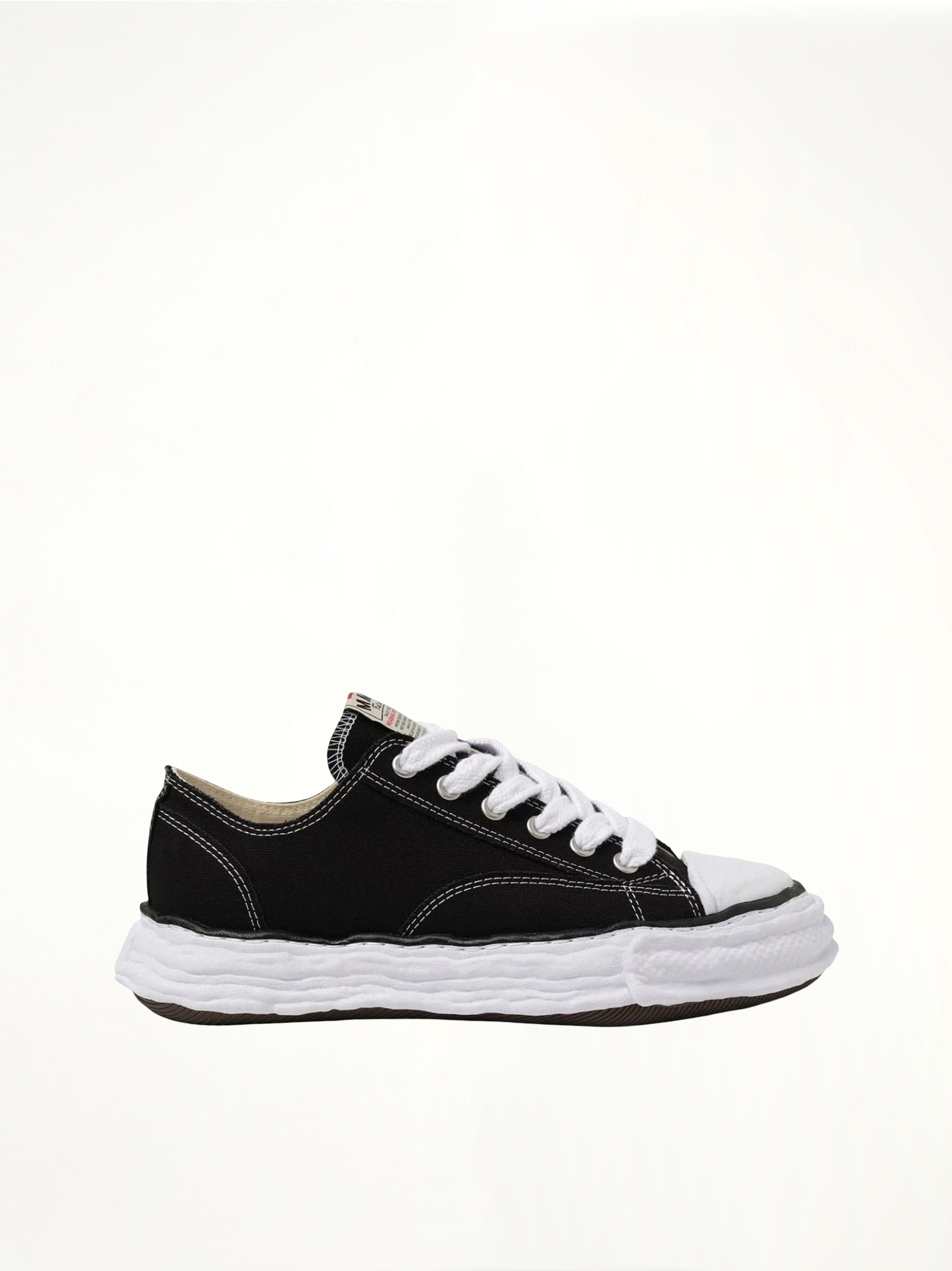 Peterson 23 OG Sneaker in Black/White Side View | MAISON MIHARA YASUHIRO