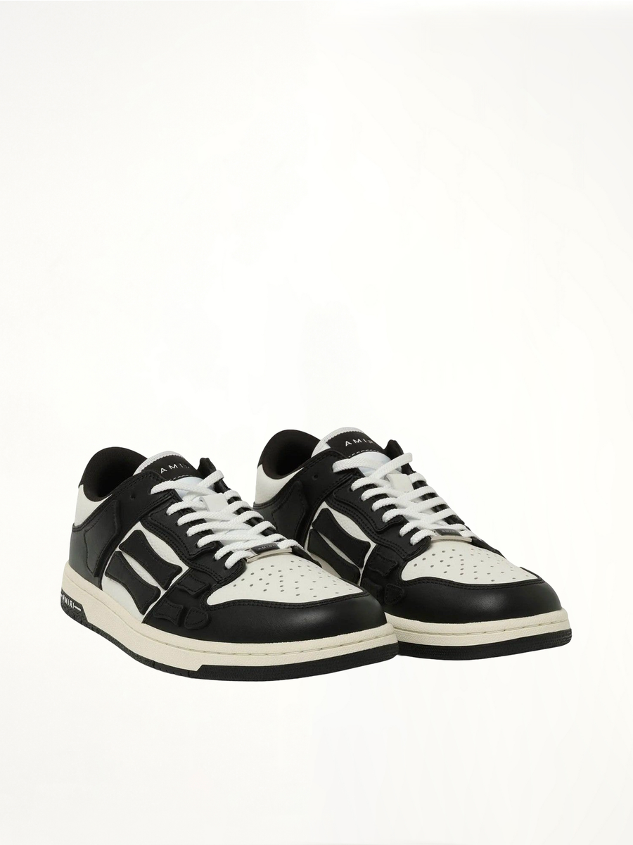 Skeleton Low Sneaker in Black/White Front View | AMIRI