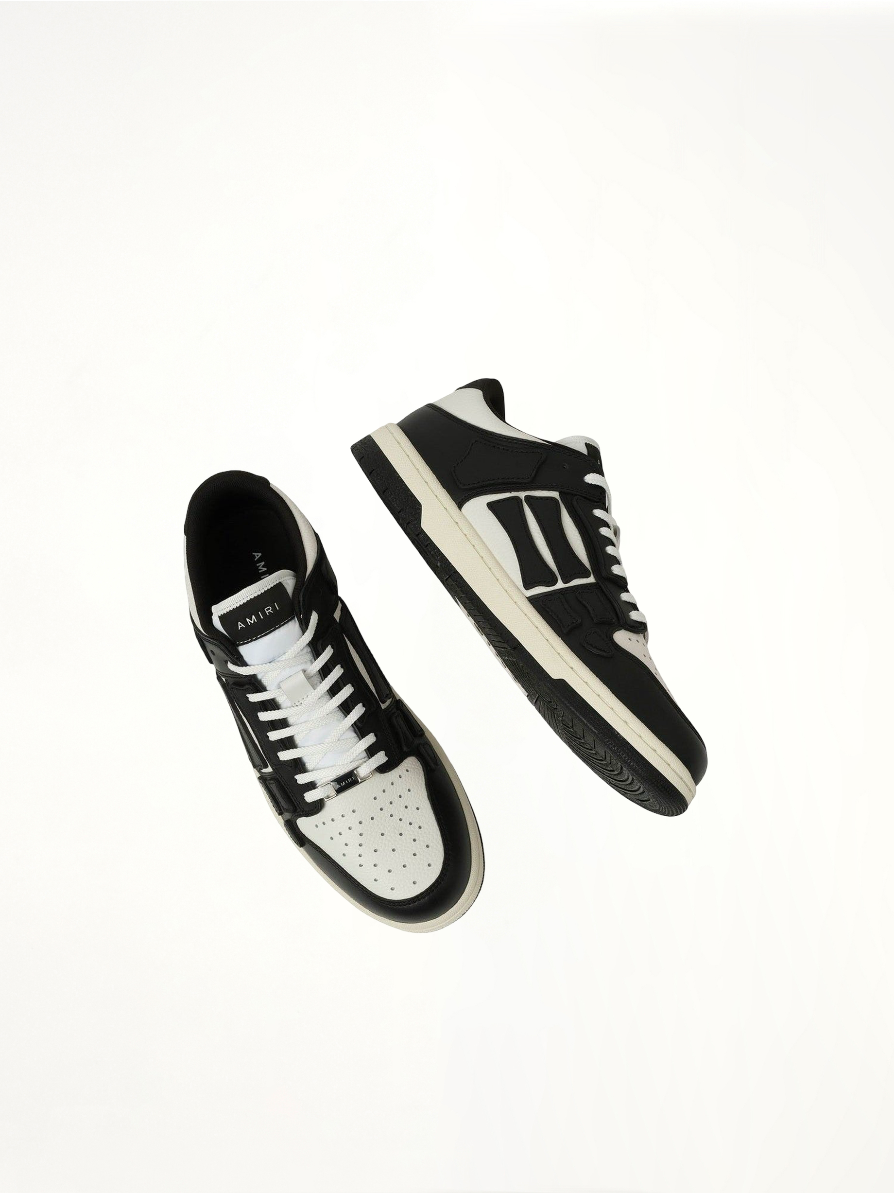 Skeleton Low Sneaker in Black/White Top View | AMIRI