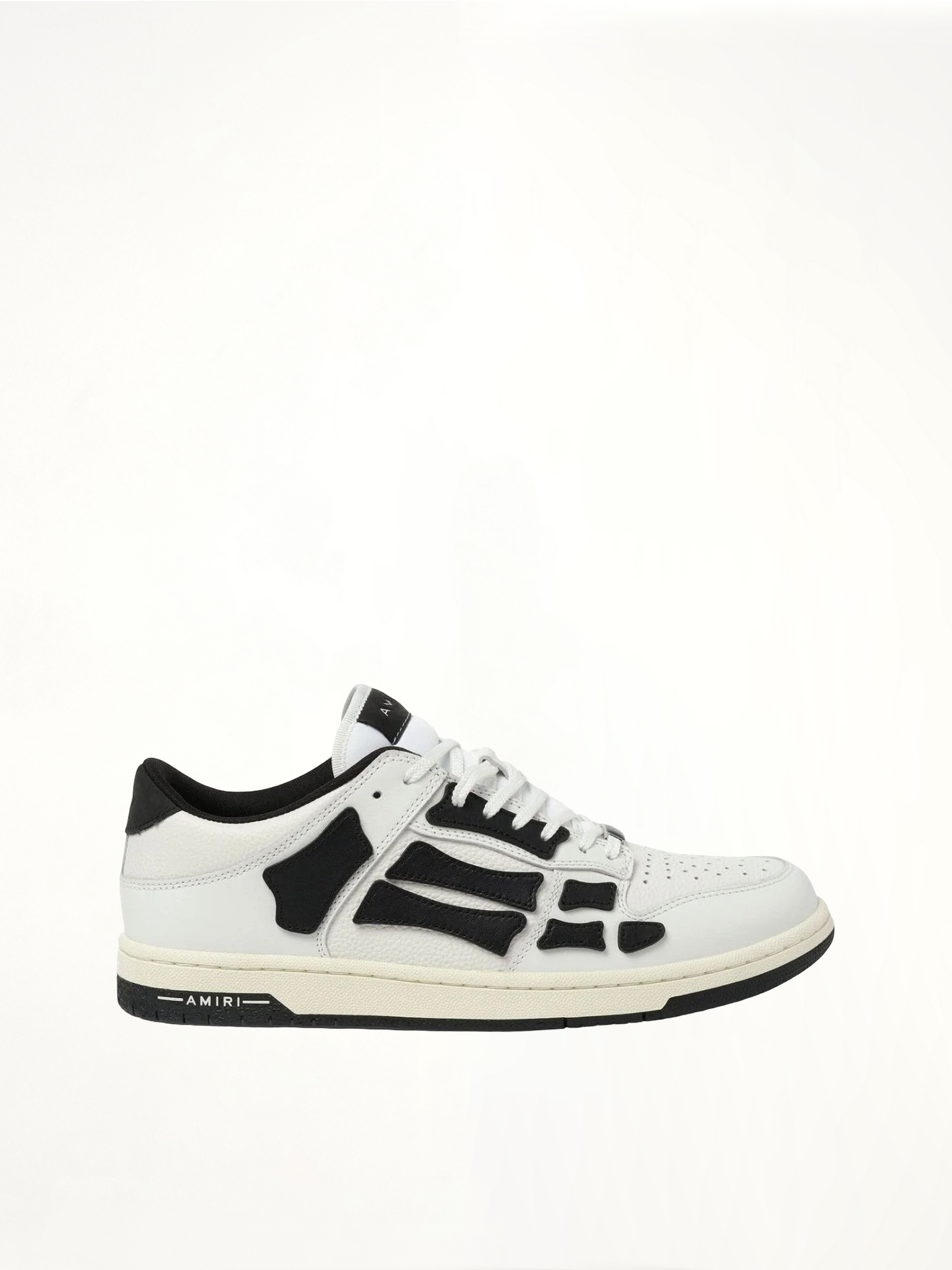 Skeleton Low Sneaker in White/Black Side View | AMIRI