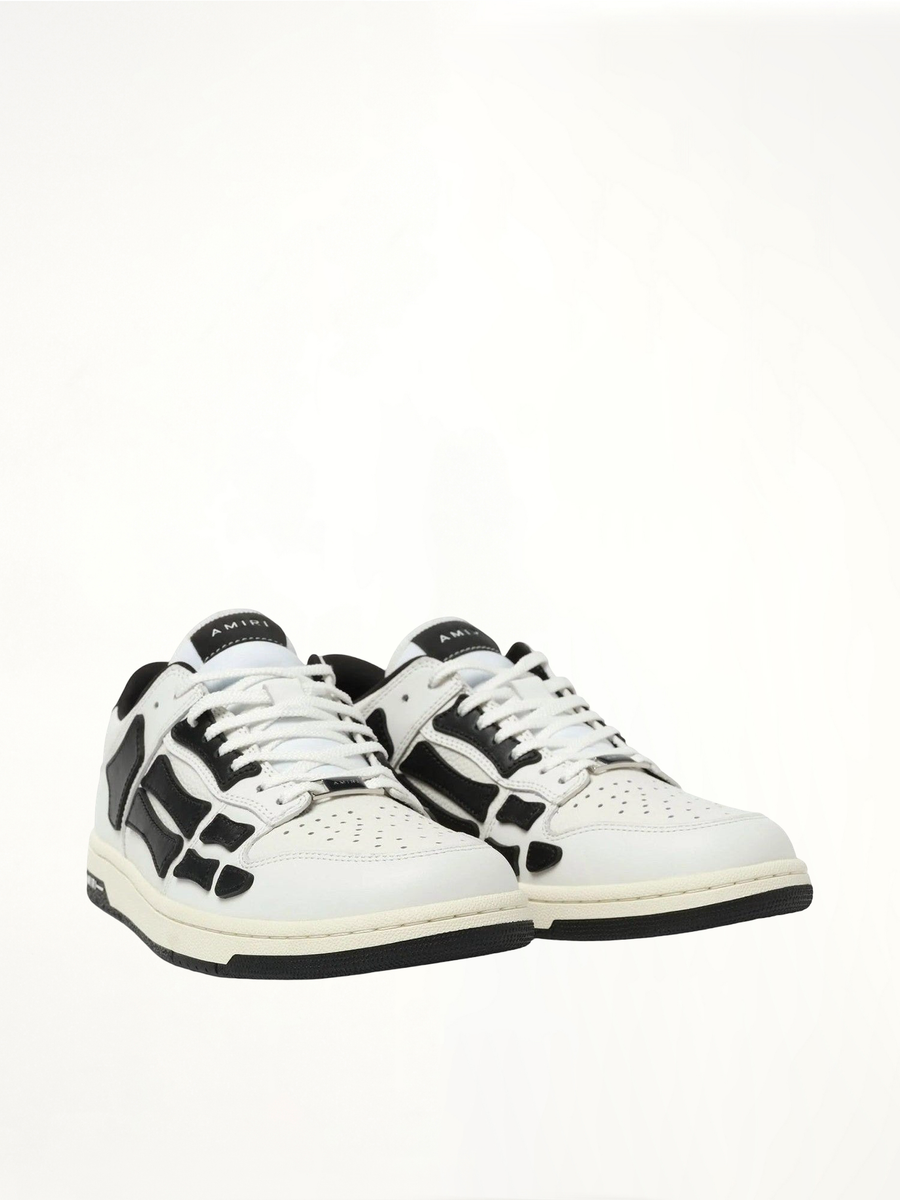 Skeleton Low Sneaker in White/Black Front View | AMIRI