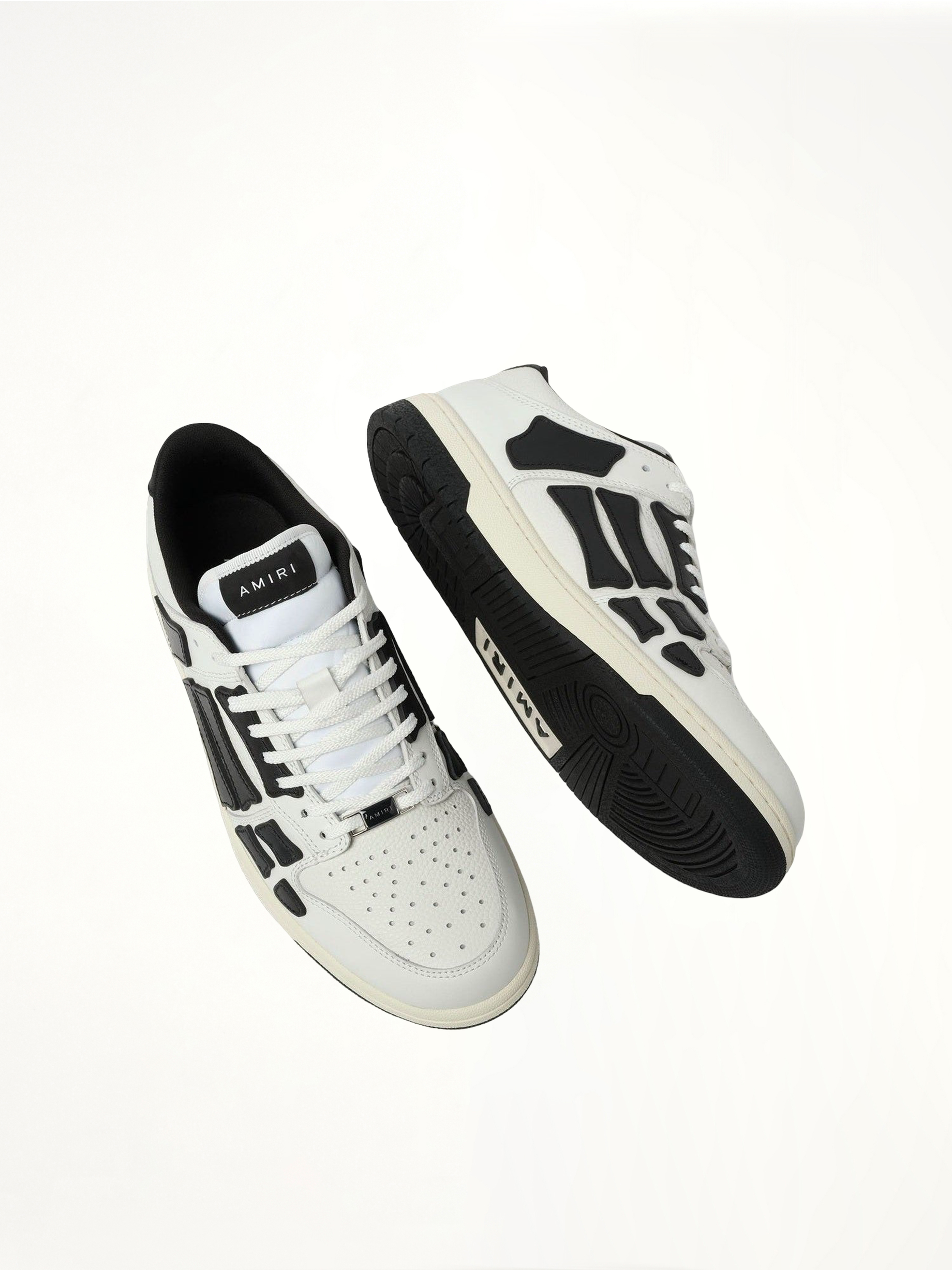 Skeleton Low Sneaker in White/Black Top View | AMIRI