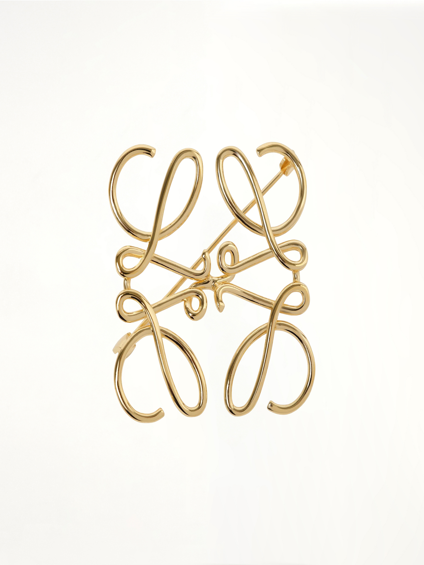 Anagram Brooch in Gold