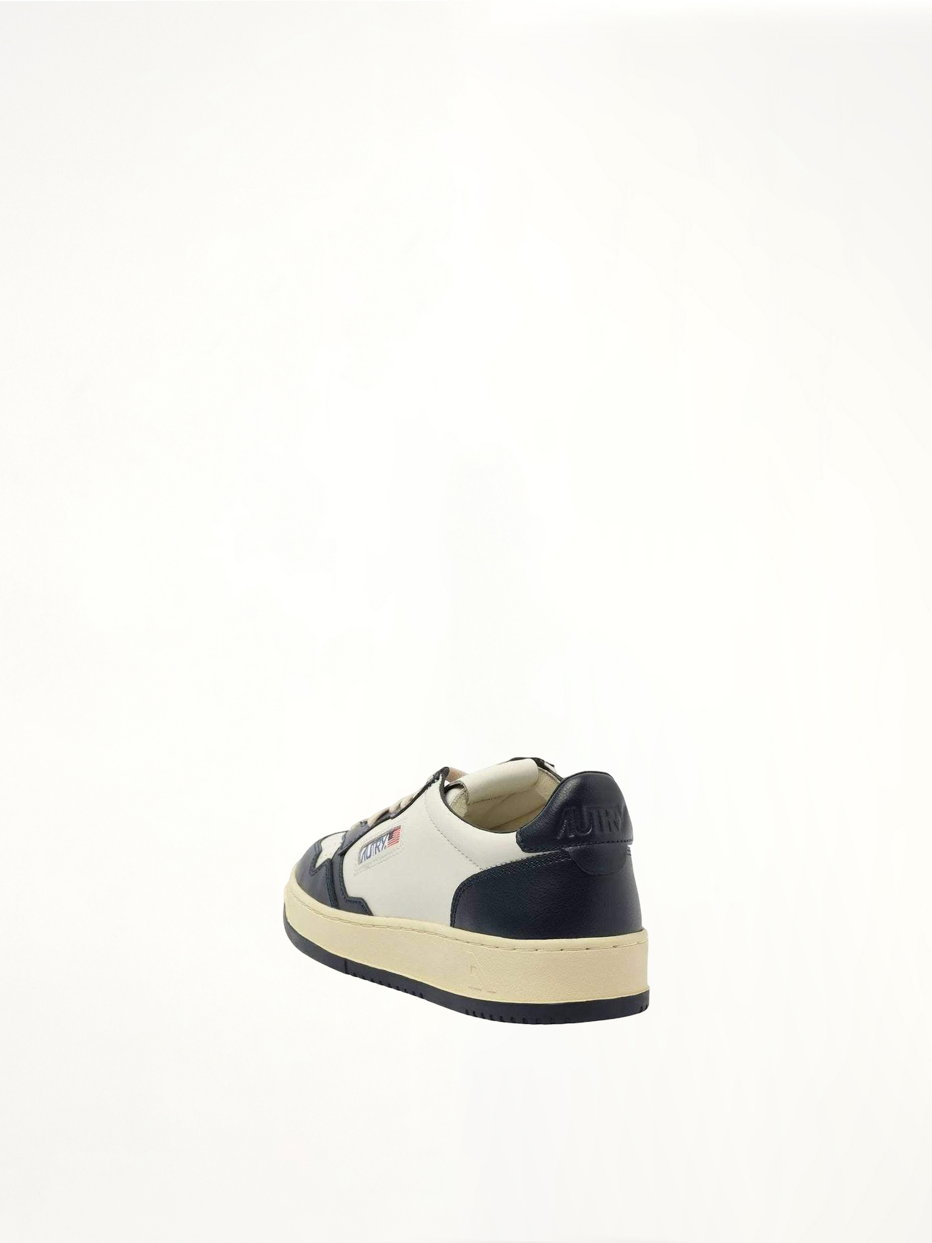 Medalist Low Bicolour Sneakers in White/Blue Back View | AUTRY
