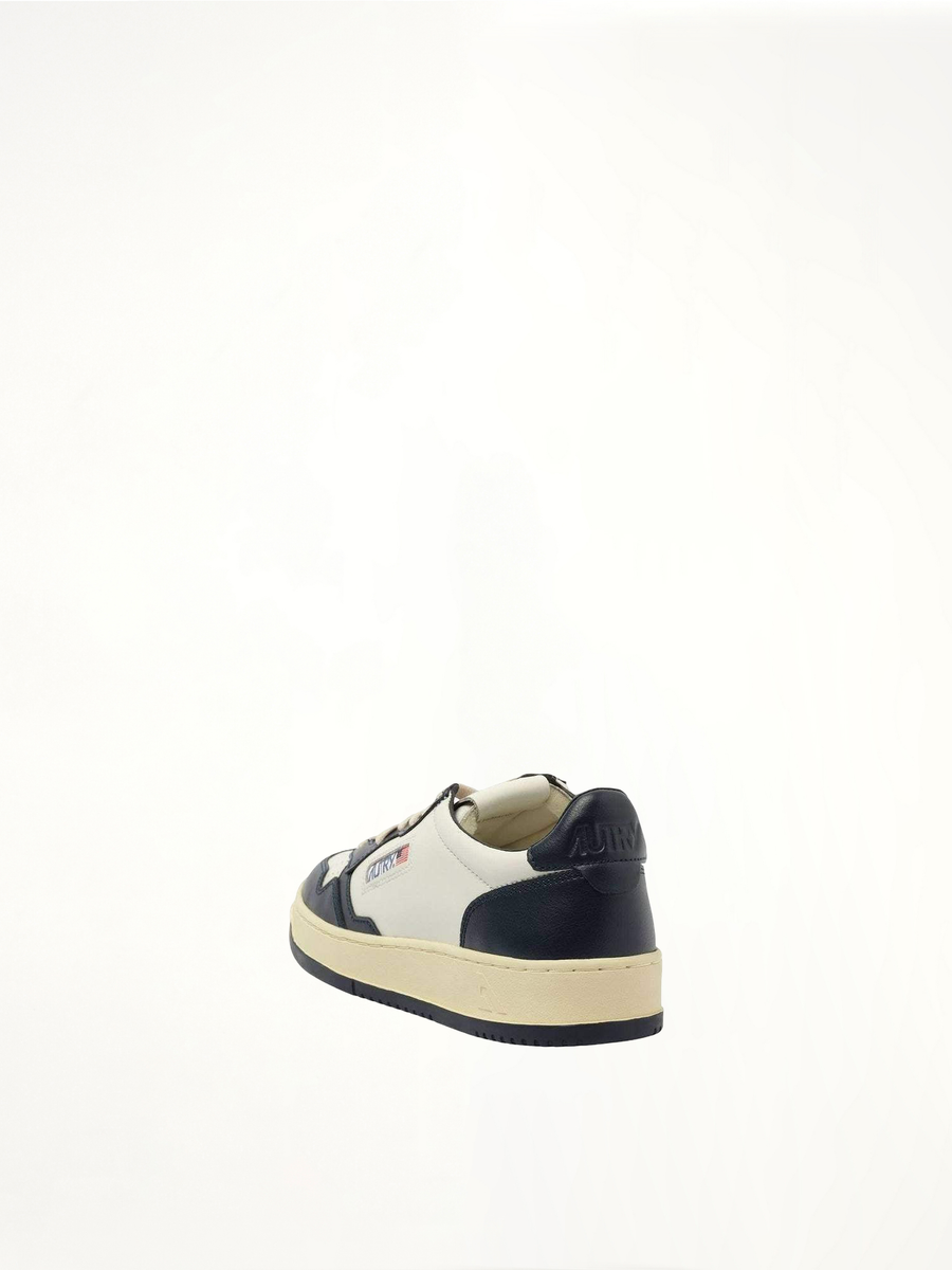 Medalist Low Bicolour Sneakers in White/Blue Back View | AUTRY