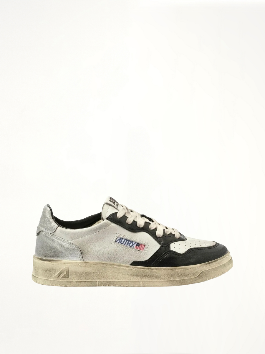 Sup Vint Low Sneakers in White/Black/Silver Side View | AUTRY