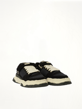 KEITH OG Low Top Sneaker in Black/White Front View | MAISON MIHARA YASUHIRO