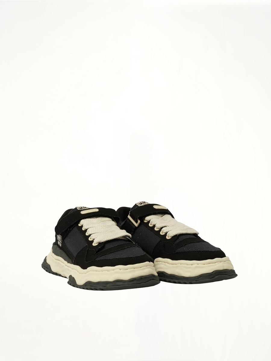 KEITH OG Low Top Sneaker in Black/White Front View | MAISON MIHARA YASUHIRO