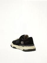 KEITH OG Low Top Sneaker in Black/White Back View | MAISON MIHARA YASUHIRO