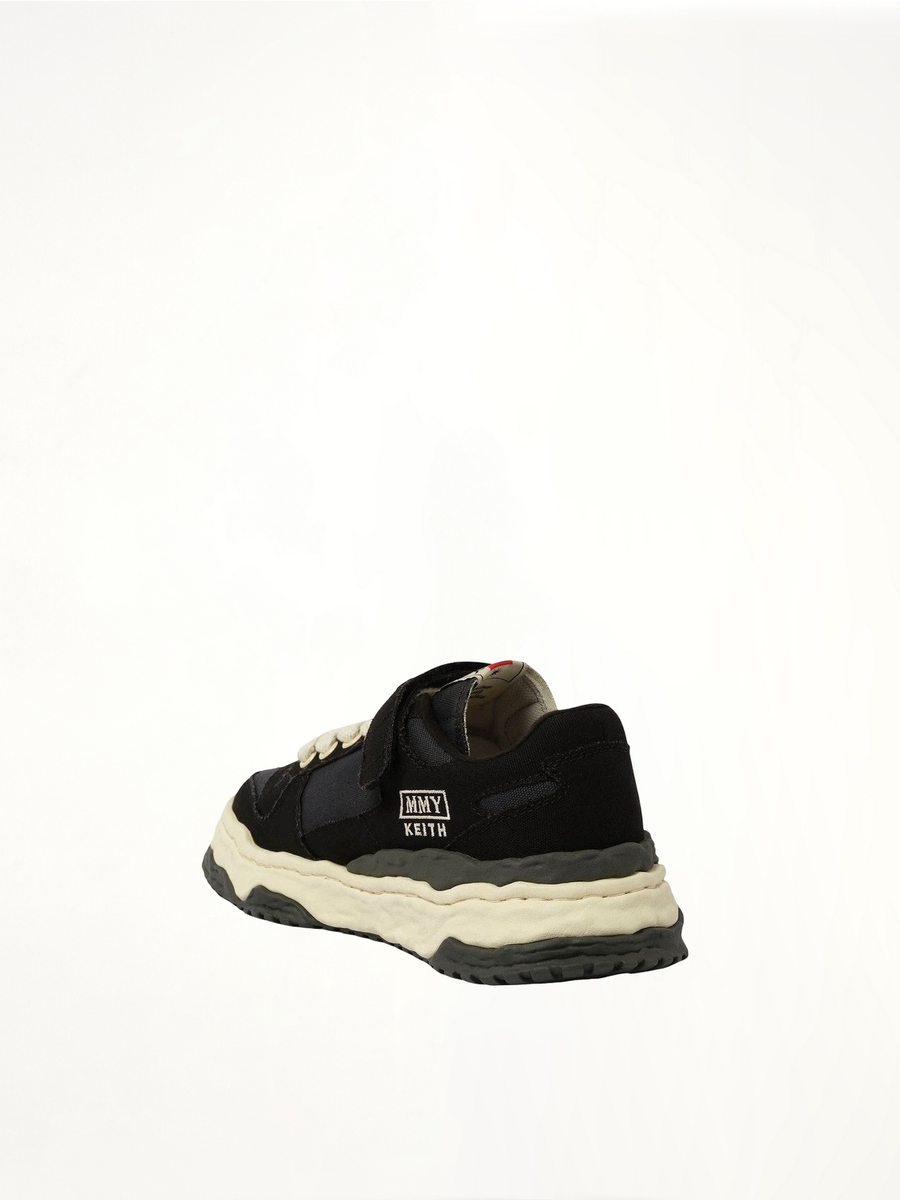 KEITH OG Low Top Sneaker in Black/White Back View | MAISON MIHARA YASUHIRO