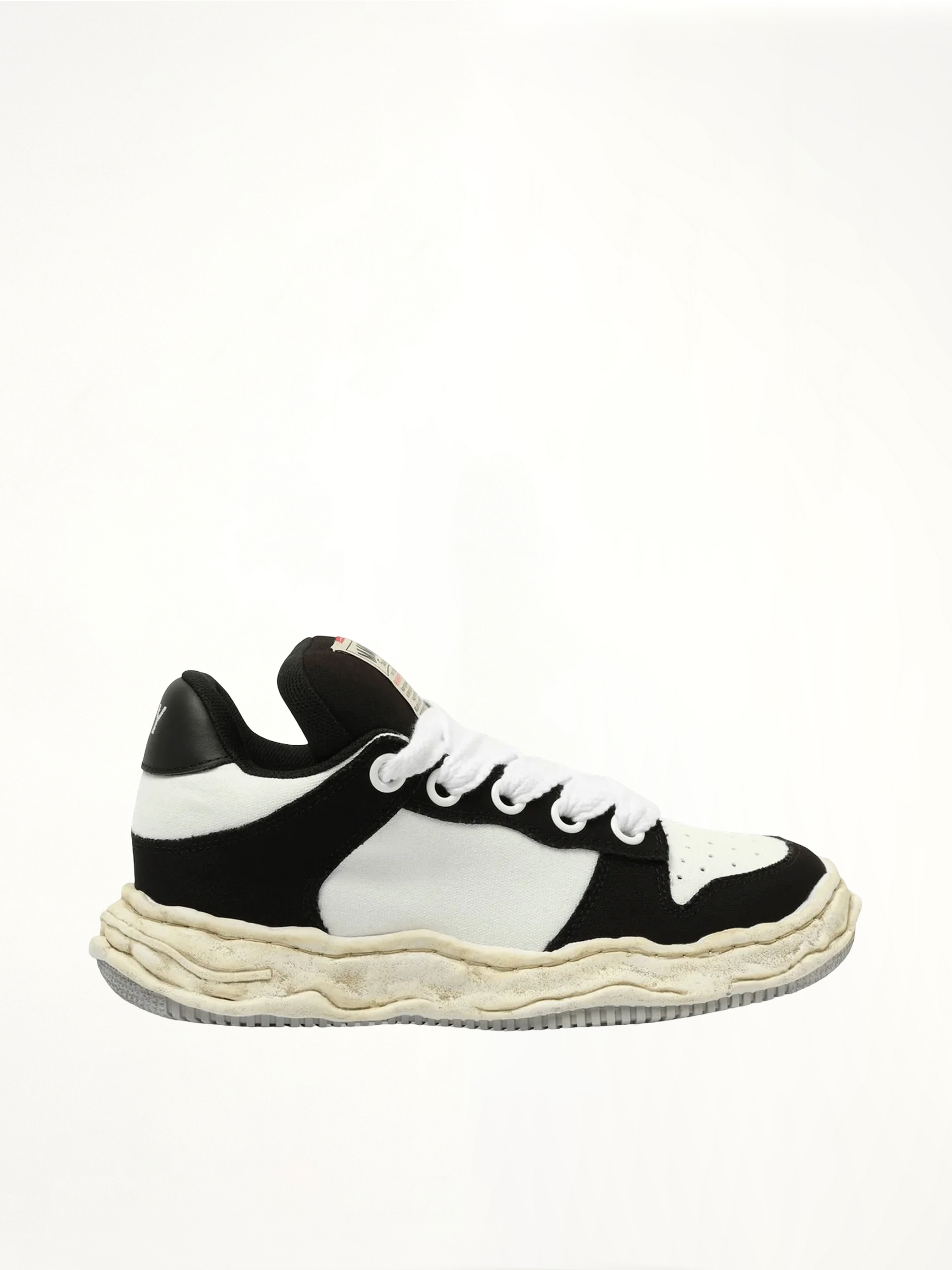 WAYNE OG Puffer Sneaker in Black/White Side View | MAISON MIHARA YASUHIRO
