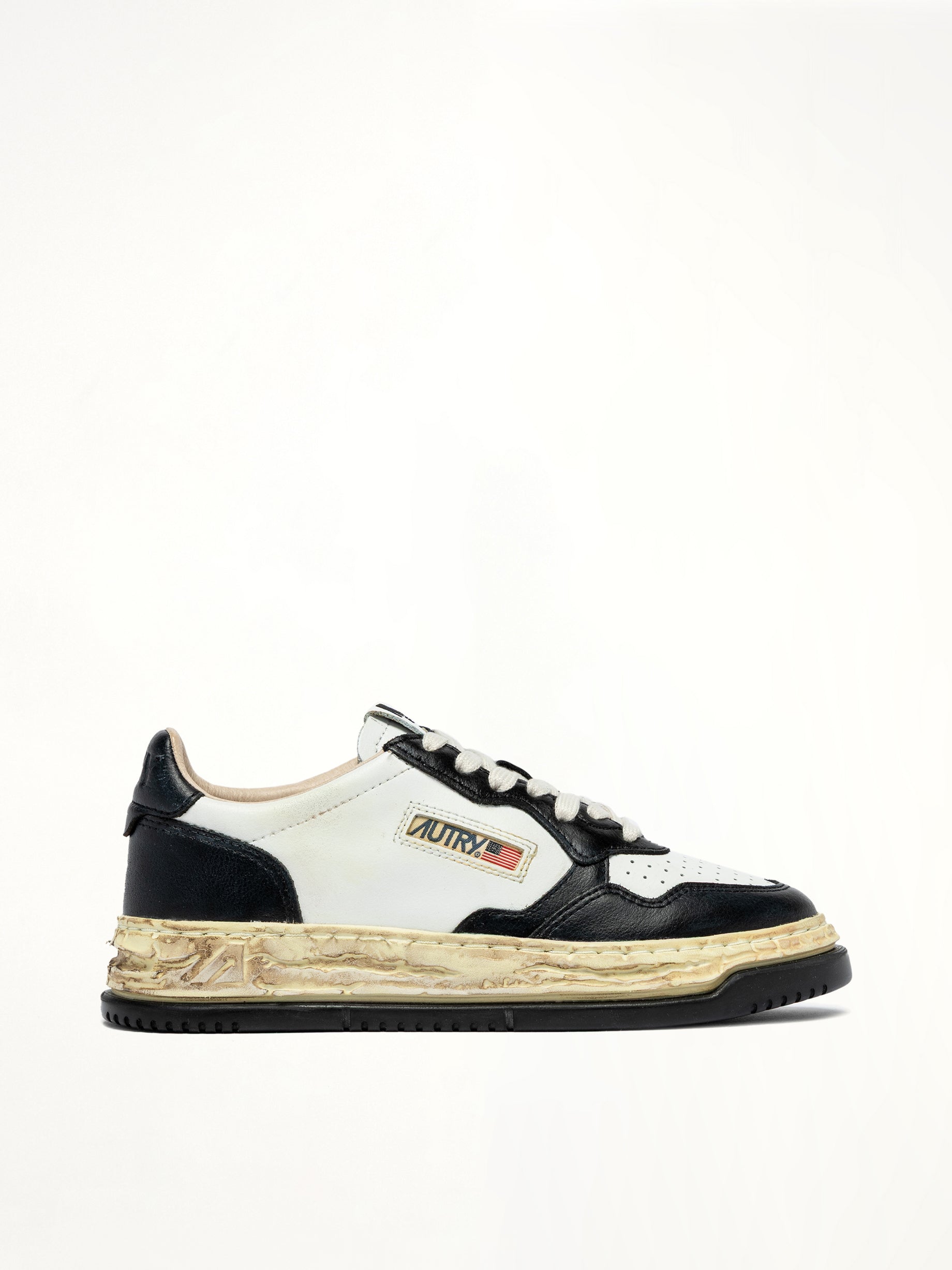 MMY Super Vintage Low Sneaker in White/Black Side View | AUTRY
