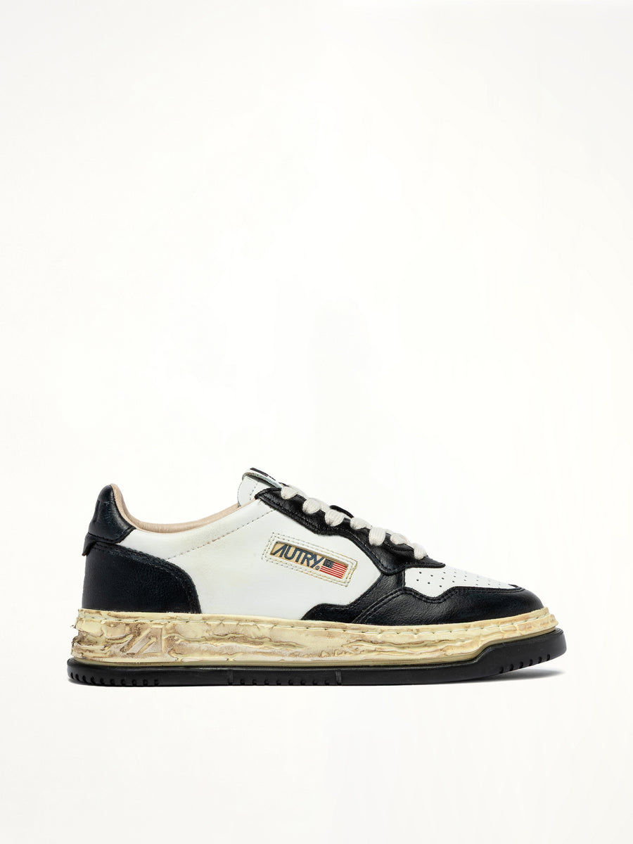 MMY Super Vintage Low Sneaker in White/Black Side View | AUTRY