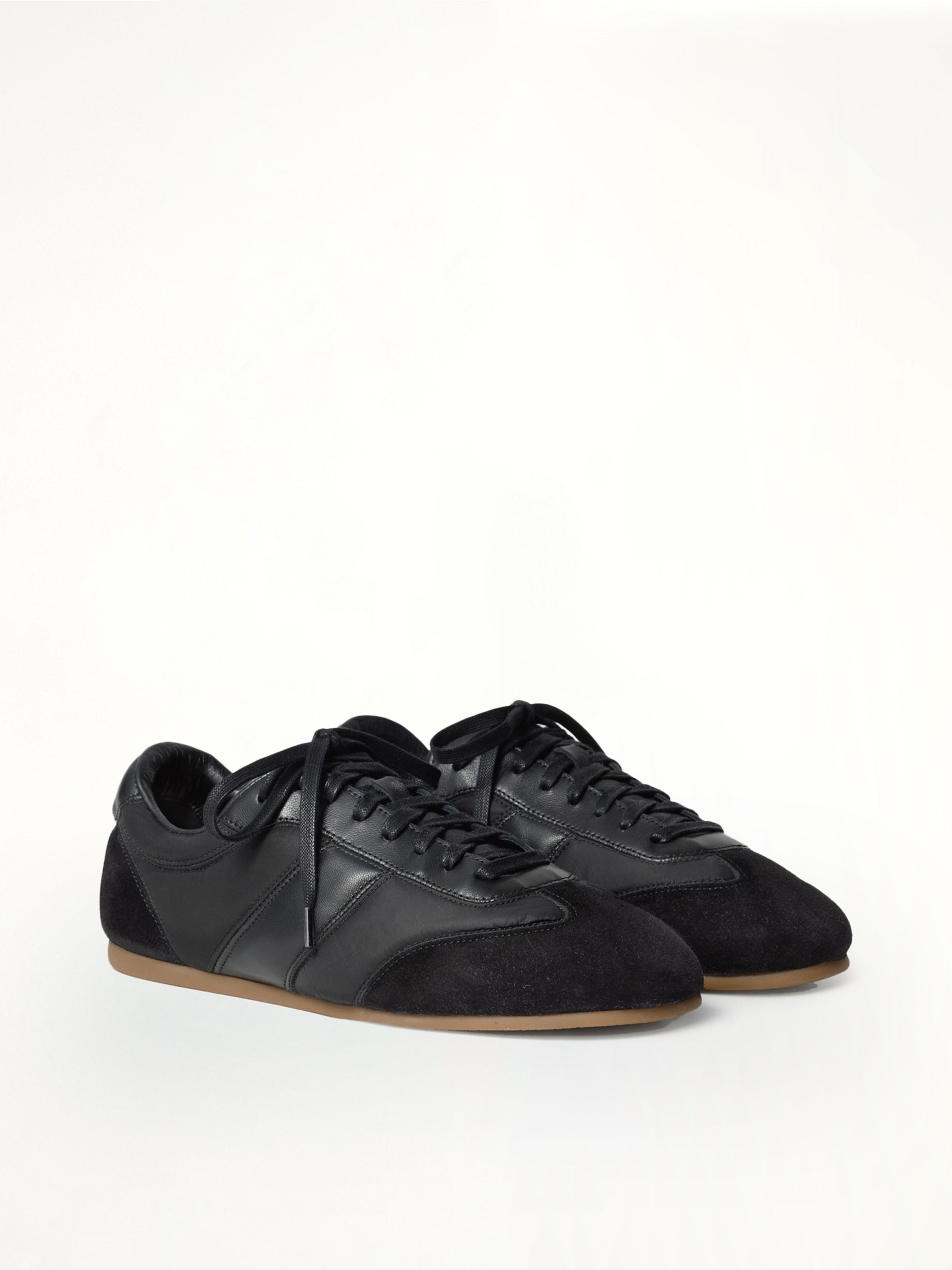 LEMAIRE Soft Runner in Black Front View from MARAIS