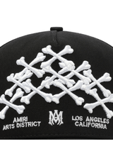Amiri Bones Stacked Trucker Hat in Black