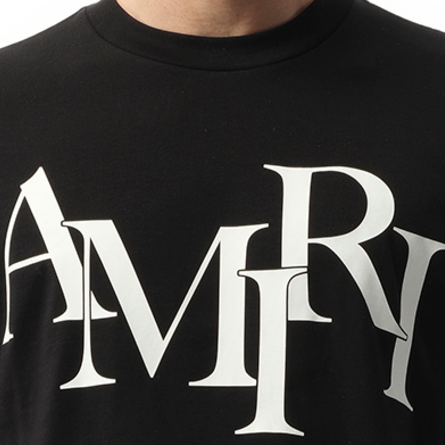 Amiri Staggered Logo T-Shirt in Black