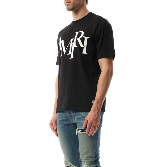 Amiri Staggered Logo T-Shirt in Black