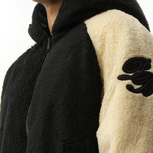 Reversible Hooded Teddy Puffer Jacket in Black/White