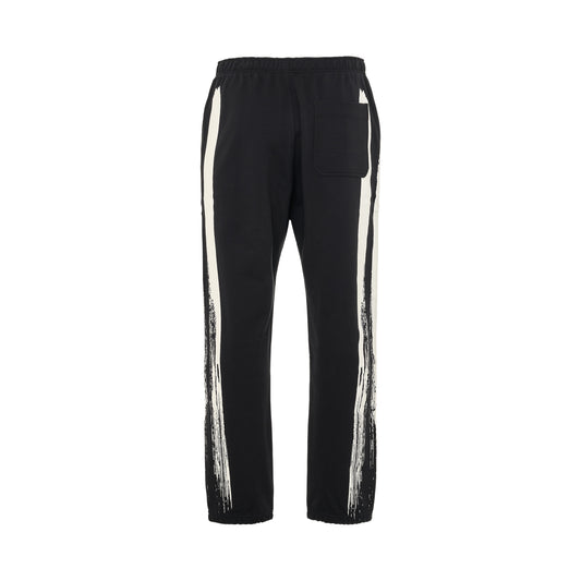 Logo Print Track Pants in Black/Cream White