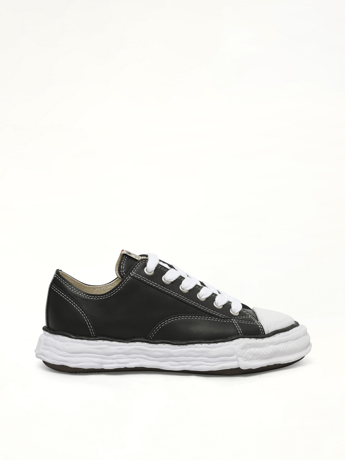 Peterson 23 OG Low Leather Sneaker in Black/White Side View | MAISON MIHARA YASUHIRO