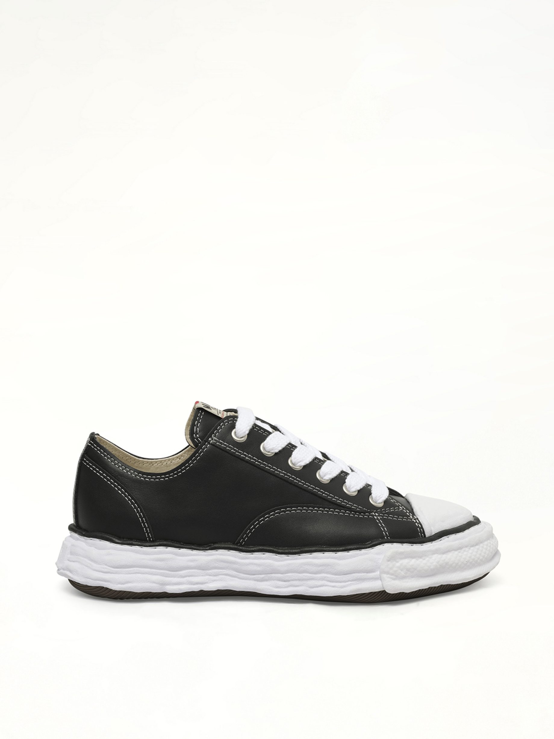 Peterson 23 OG Low Leather Sneaker in Black/White Side View | MAISON MIHARA YASUHIRO