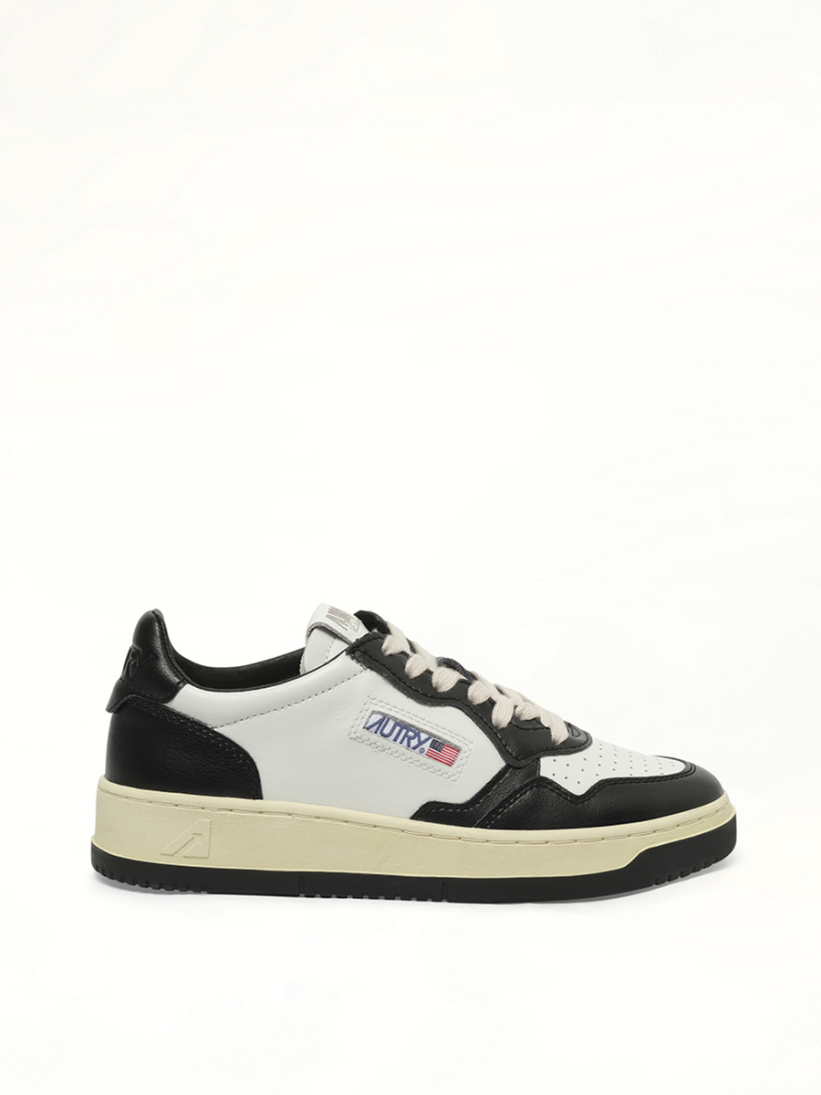 Medalist Low Bicolour Sneakers in White/Black Side View | AUTRY