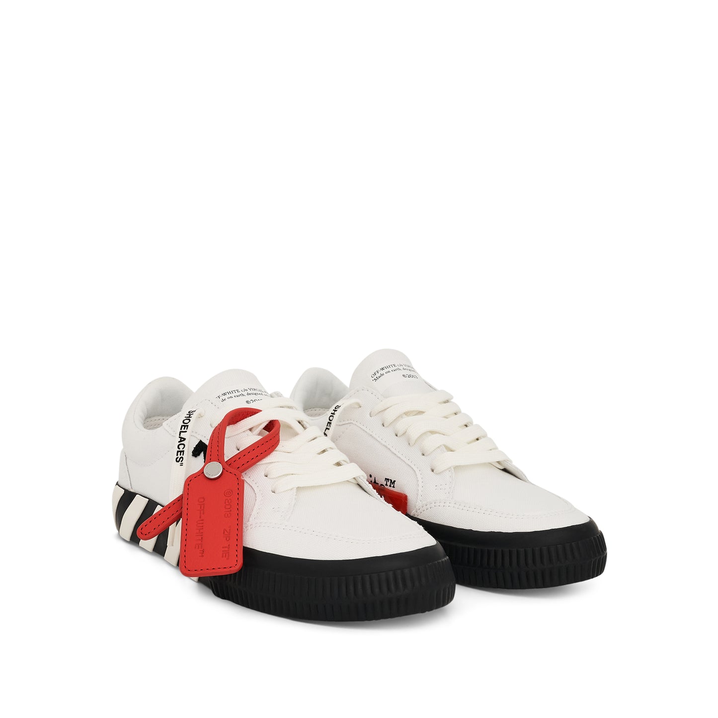 Low Vulcanized Canvas Sneakers in White/Black Colour