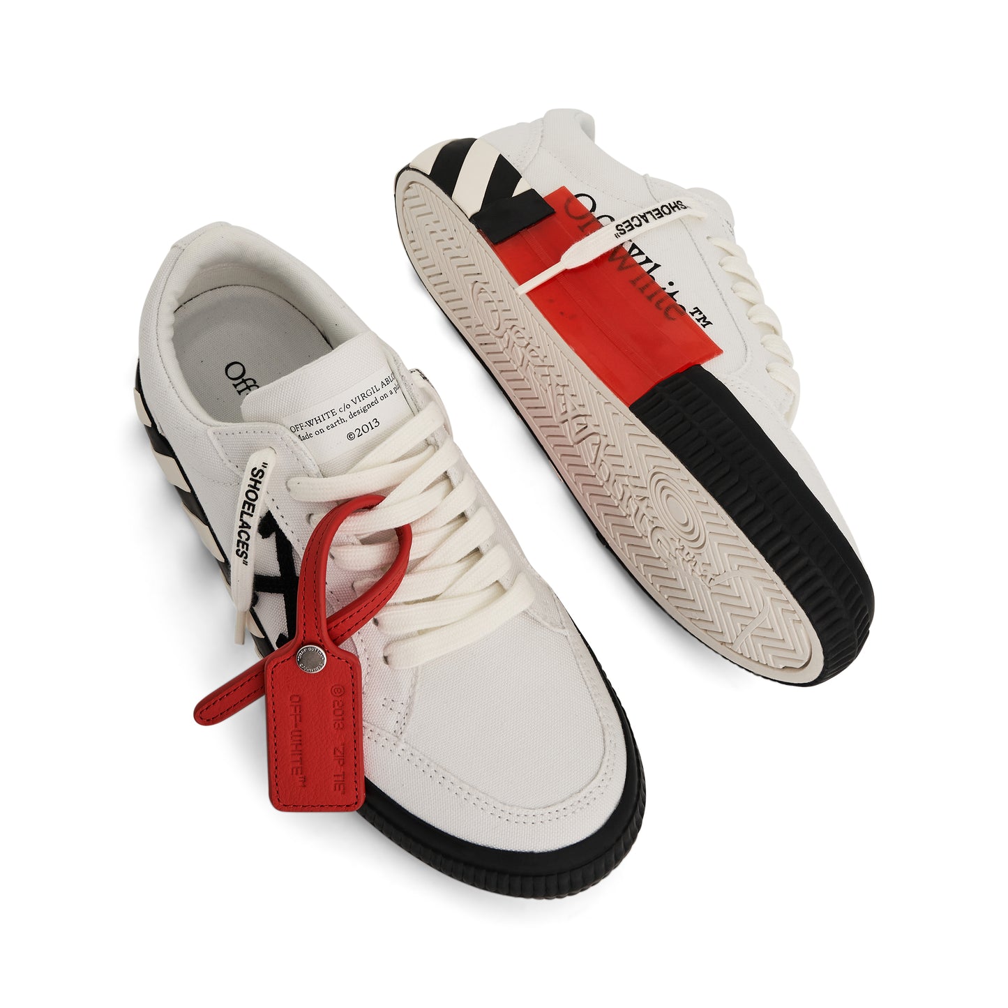 Low Vulcanized Canvas Sneakers in White/Black Colour