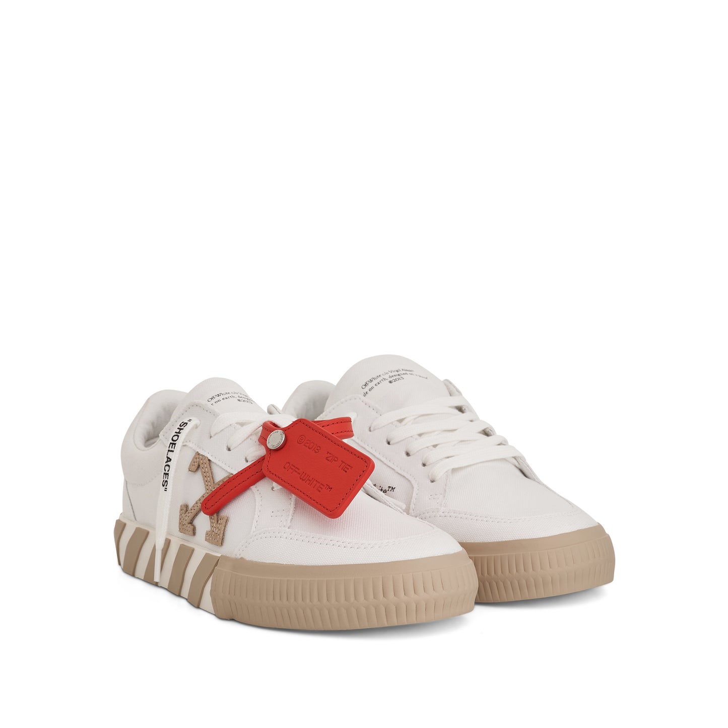 Low Vulcanized Canvas Sneakers in White/Sand