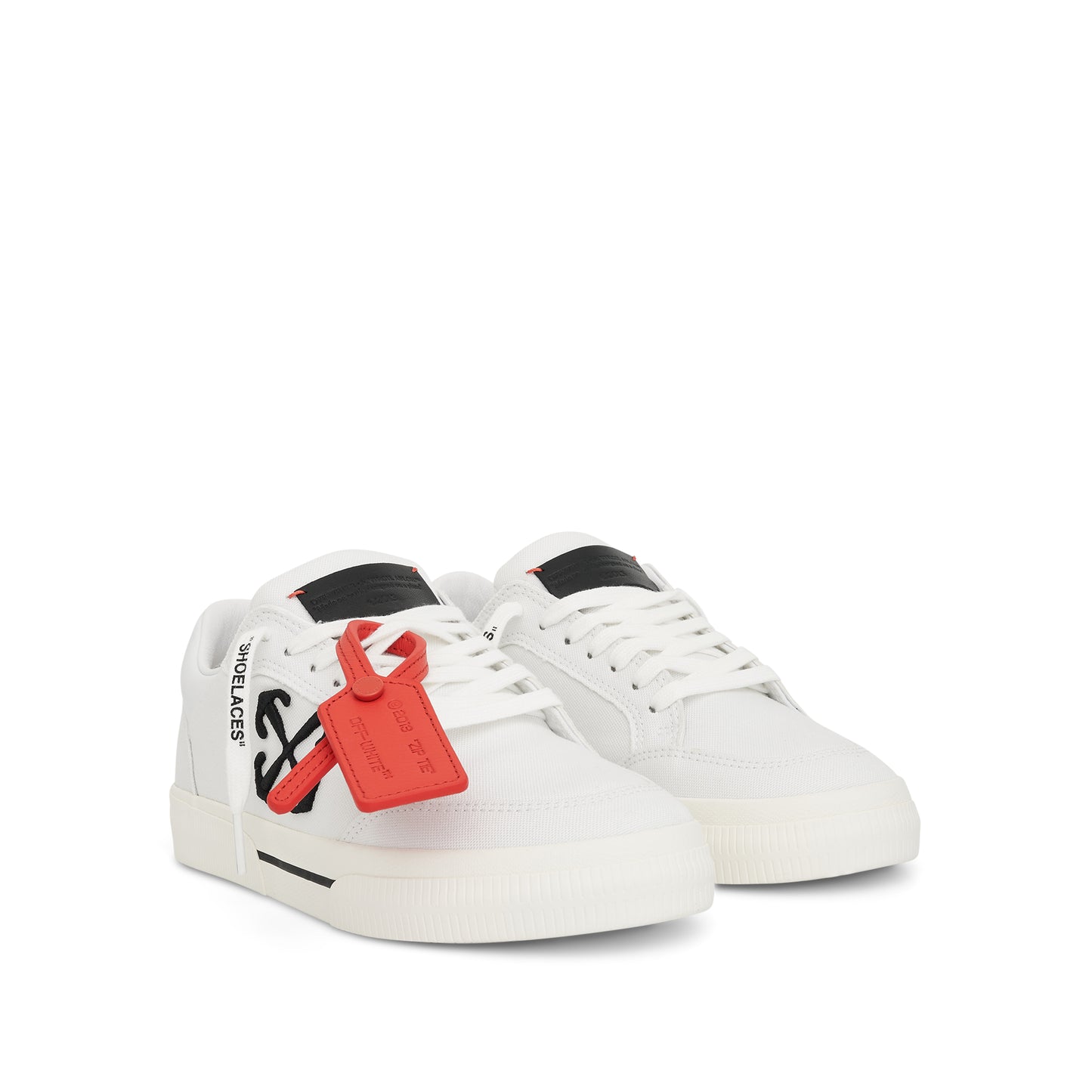 Women New Low Vulcanized Canvas Sneaker in White/Black