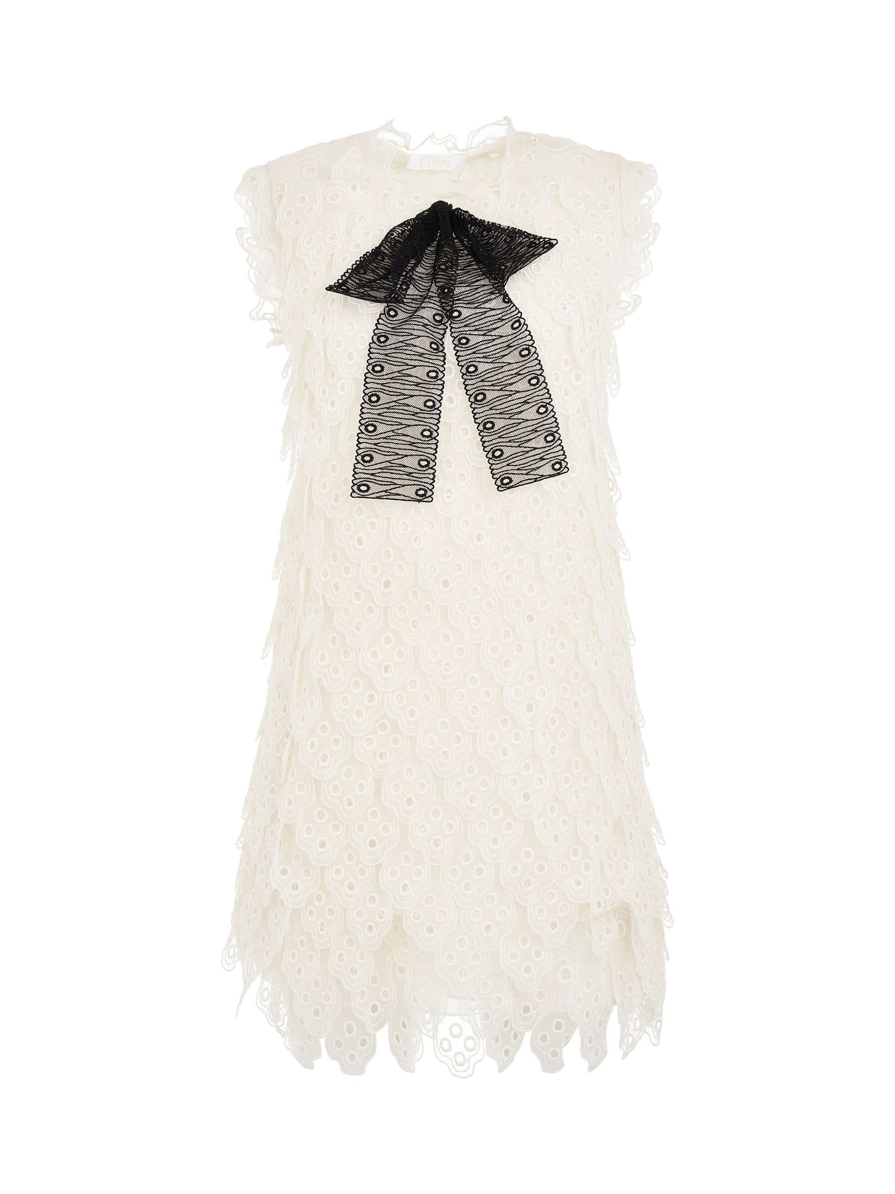 Dress in White with Black Bow