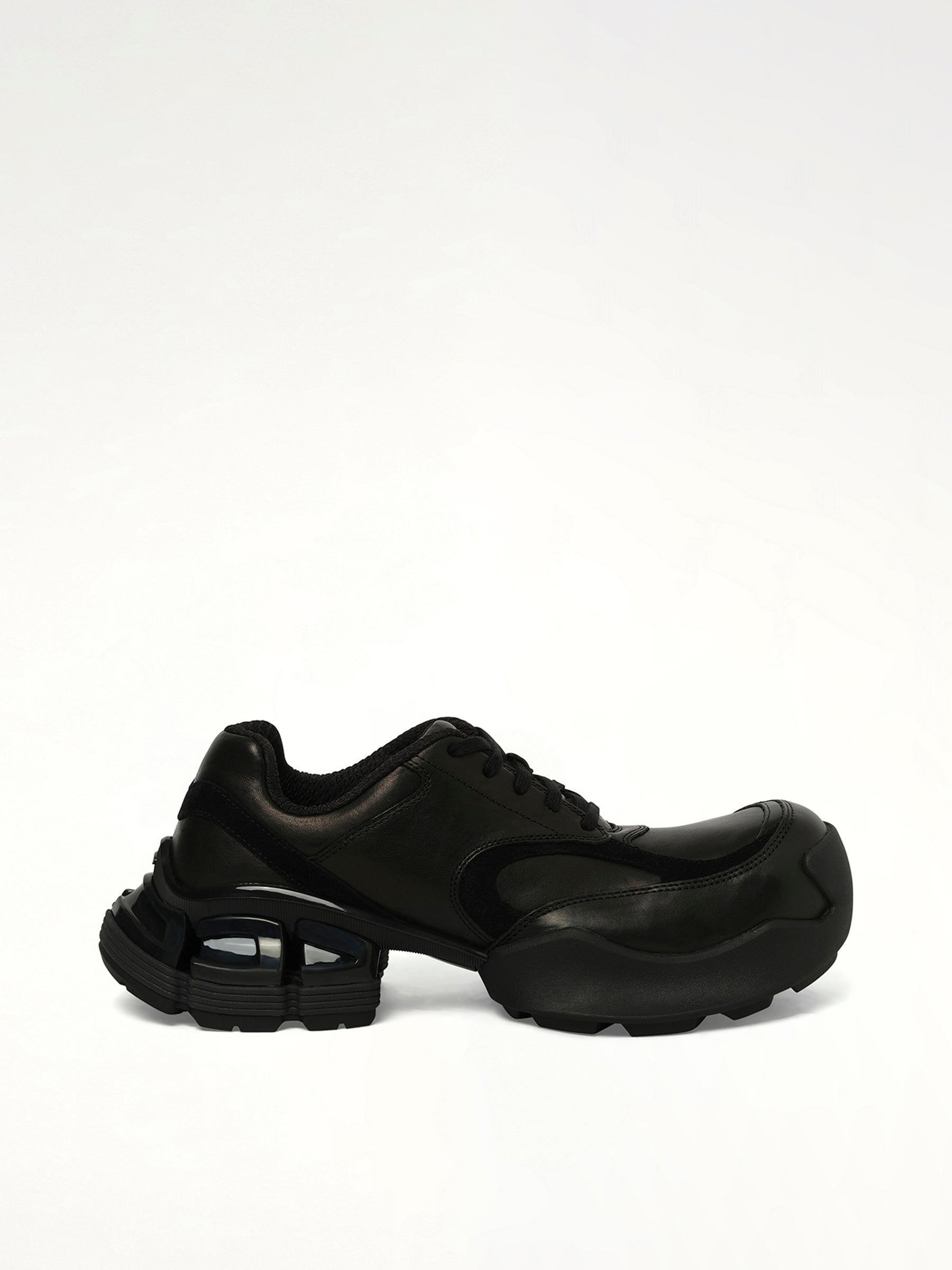 The Core Sneaker in Black Side View | REMAGINE