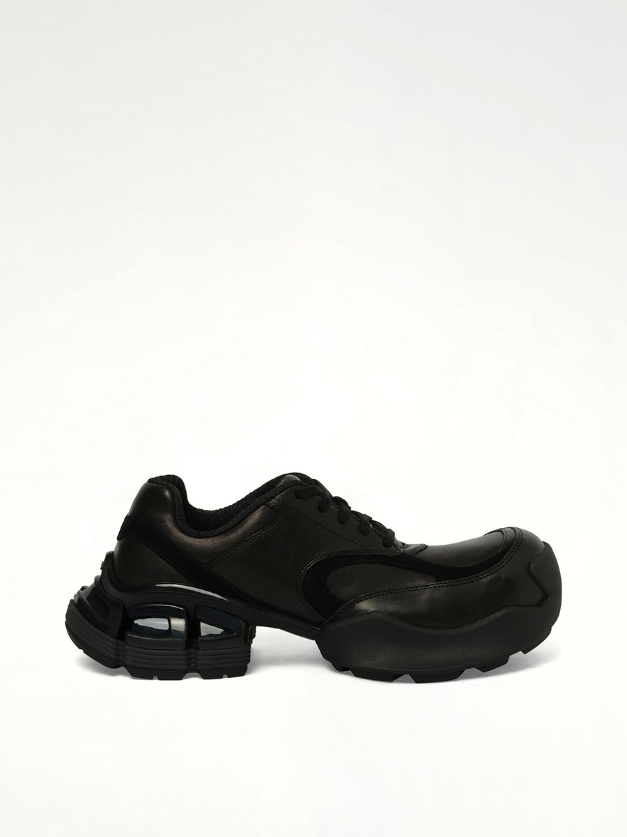 The Core Sneaker in Black Side View | REMAGINE
