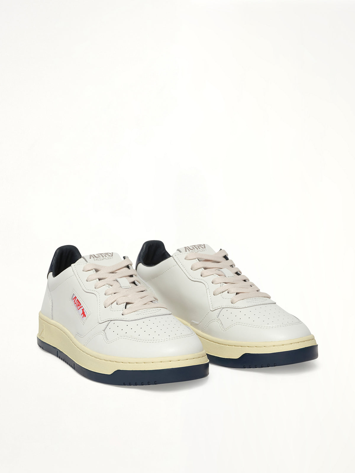Maison Kitsune Medalist Sneaker in White/Blue Front View | AUTRY