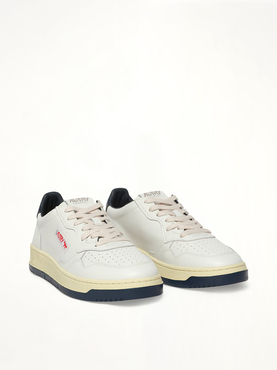 Maison Kitsune Medalist Sneaker in White/Blue Front View | AUTRY